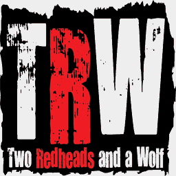 tworedheadsandawolf.com