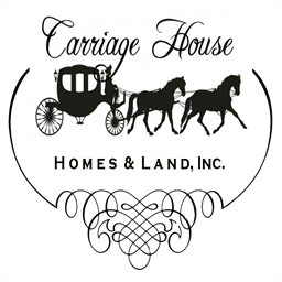 carriagehousehomesandland.com